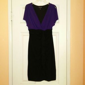 Purple and black dress and black skirt