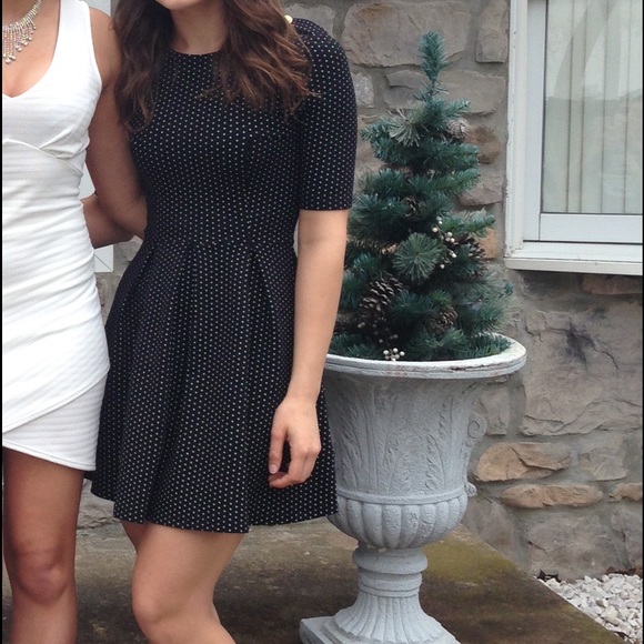 Black polka dot dress.