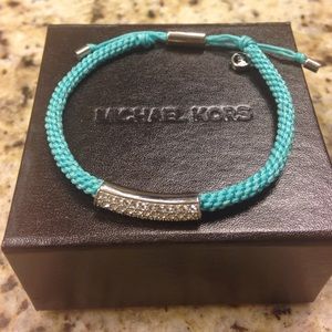 Michael Kors teal cord and rhinestone bracelet