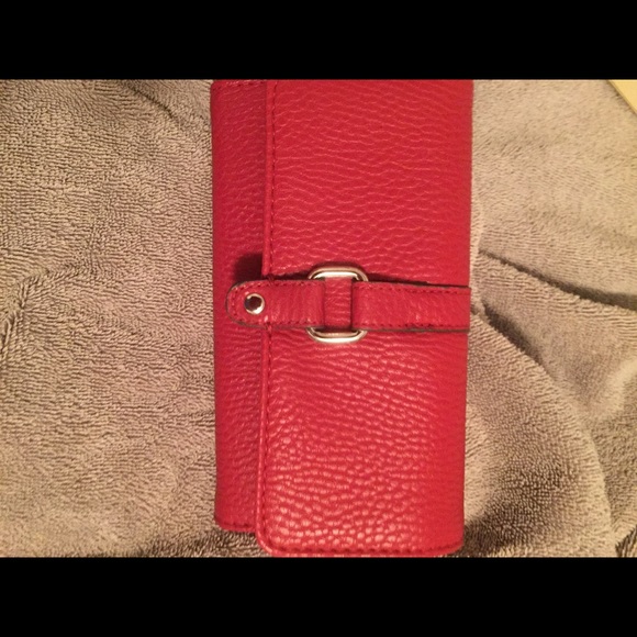 Red. No-name wallet with checkbook!  Really nice.