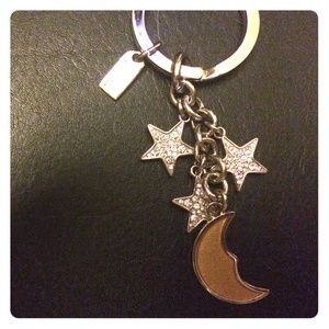 Coach- star and moon keychain.