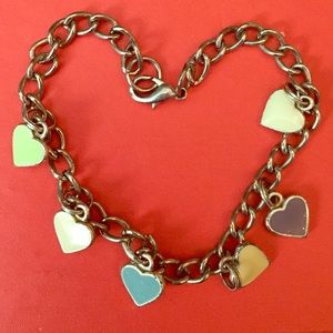 Charm (6) bracelet. 8 inches