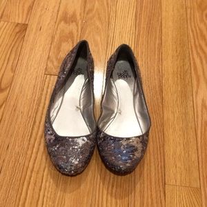 Shiny silver flats