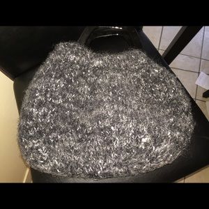 Tweed bag with no zipper.