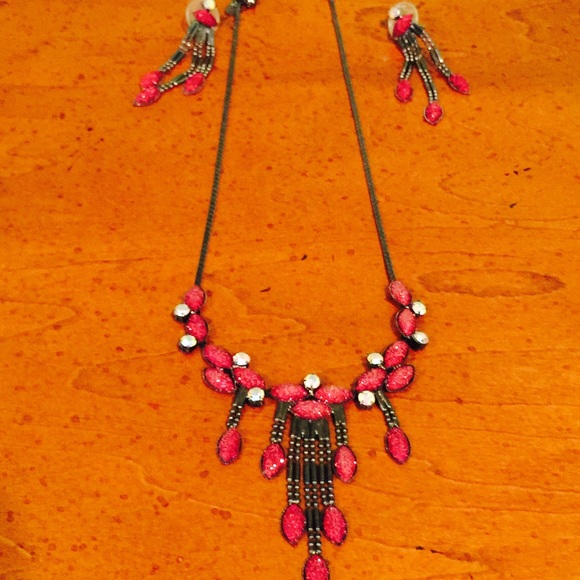 Lovely deep red necklace with matching earrings.
