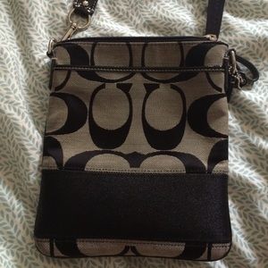 Black and Tan Coach cross body  bag