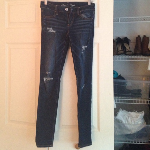 Distressed dark wash jegging