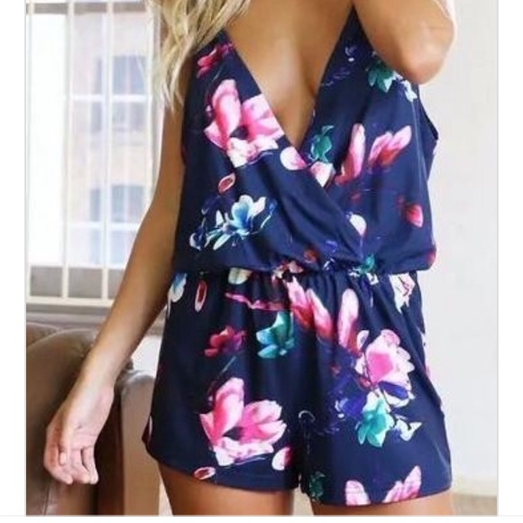 Other - Floral romper. Never been worn