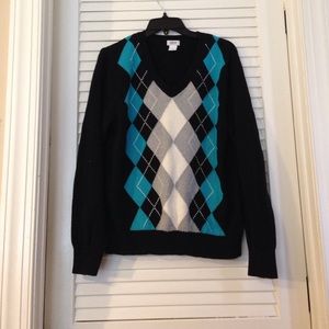 A black sweater w/ argyle pattern from IZOD.