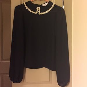 Black blouse with pearl beaded collar