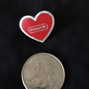Coach pin.