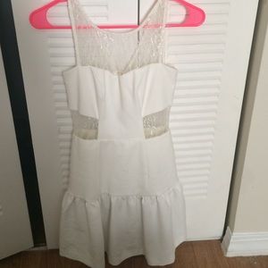Gianni Bini white lace cutout dress.