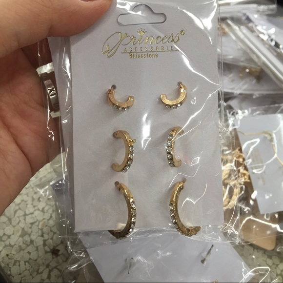 3 pairs of gold earrings