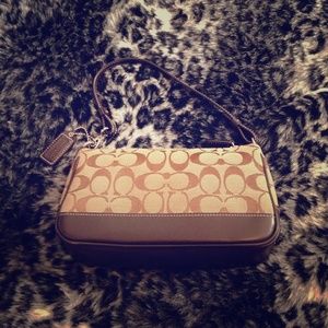 ** NEWLY MARKED DOWN** NEVER USED coach purse