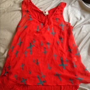 bright pink shirt with crosses