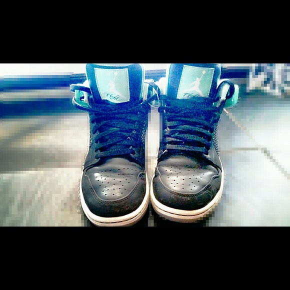 Black and aqua air jordans in men