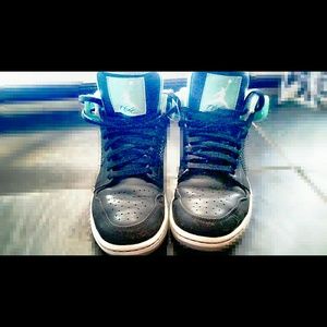 Black and aqua air jordans in men