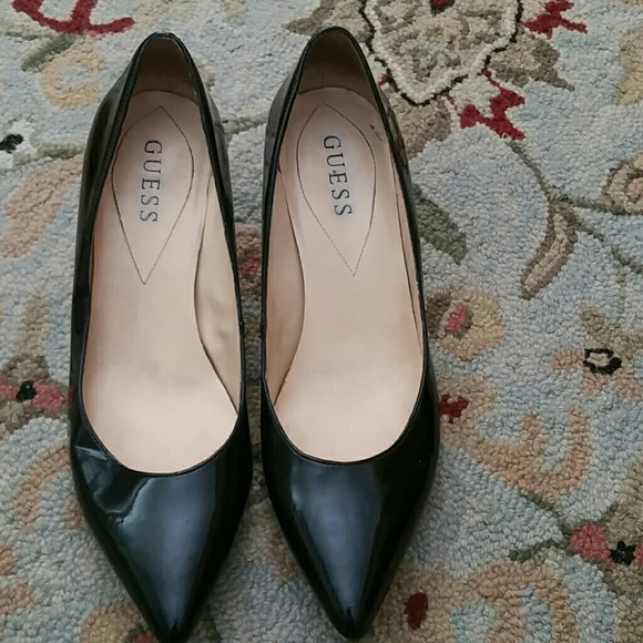 Guess patent leather 2 inch hill, has some wear.