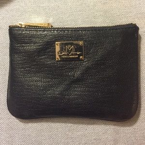 Black leather Rebecca Minkoff coin purse.