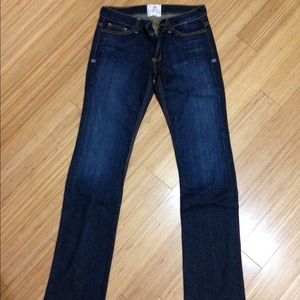 People's Liberation jeans with gold pocket accent