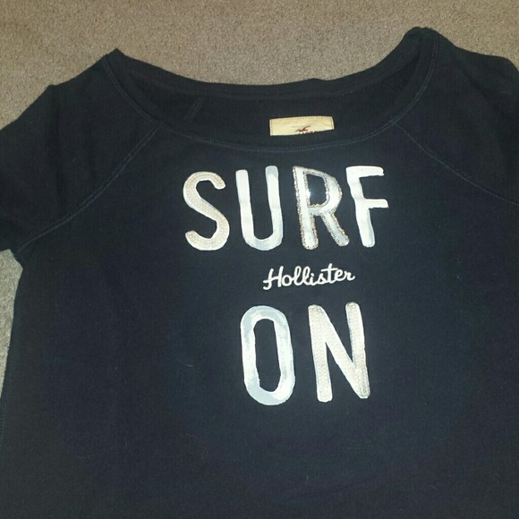 Surfs on Hollister crew neck