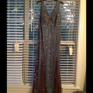 Hand beaded from David Bridal size 14.