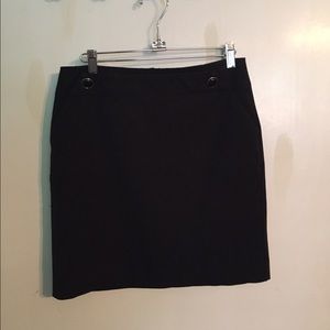 Black pencil skirt with gold button accents
