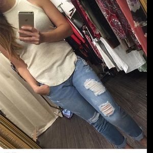 Distressed frayed jeans