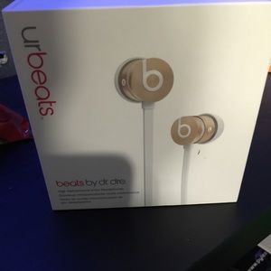 Gold beats earbuds