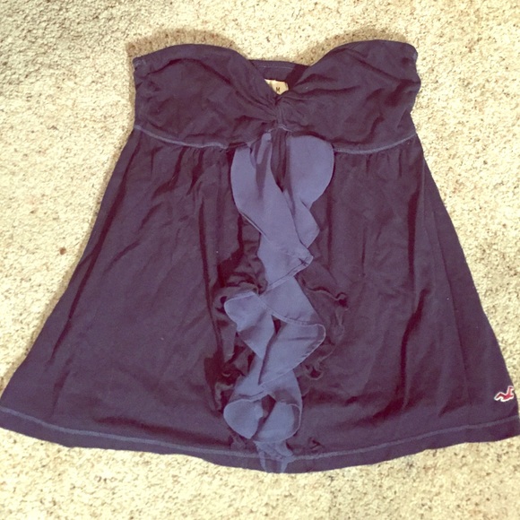 Sleeveless navy blue ruffle shirt