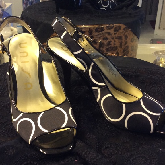 UNISA SLING BACK PATENT LEATHER & SATIN PUMP.