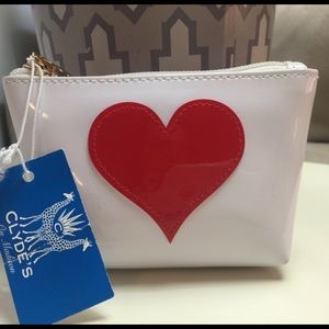 Adorable NEW red heart makeup or coin pouch.
