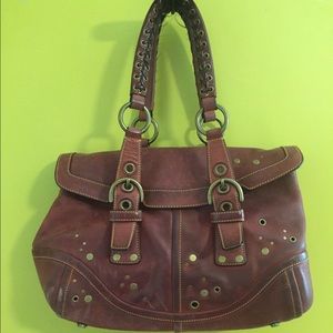 Coach Satchel in burgundy with bronze studs