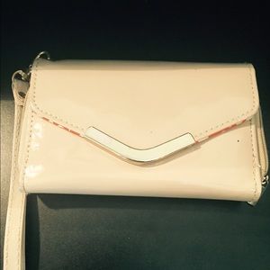 Patent leather nude with gold accent clutch