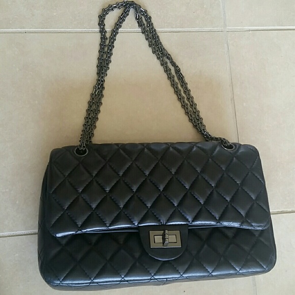 Real leather quilted handbag