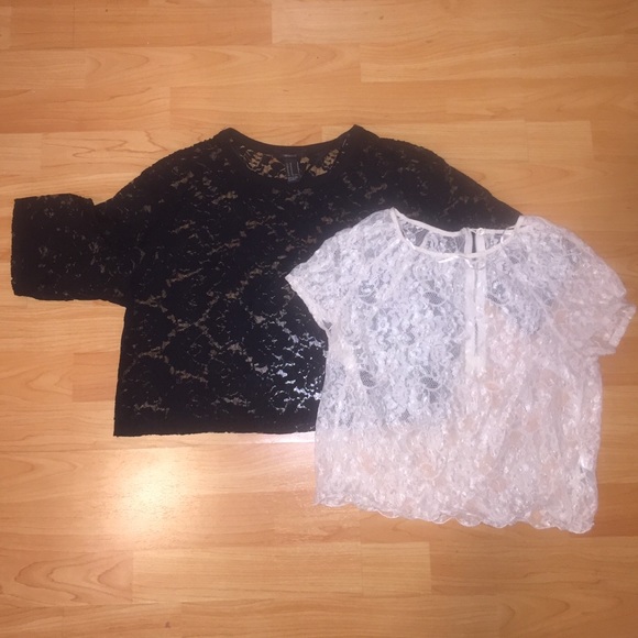 Two lace tops, one black one white