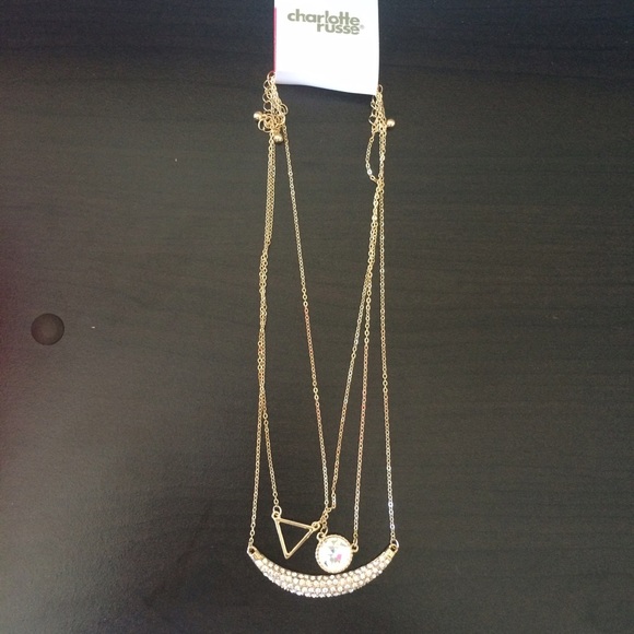 Set of three gold necklaces