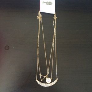 Set of three gold necklaces