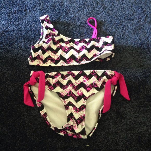 2 piece Justice swimsuit.