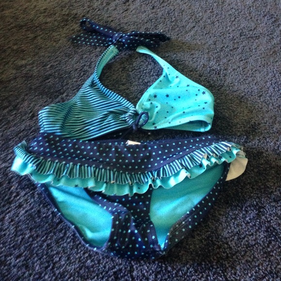 2 piece Justice swimsuit.