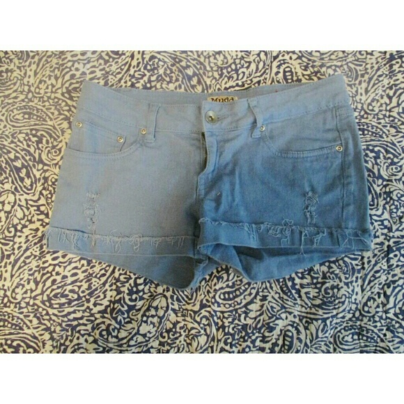 Baby blue ripped shorts