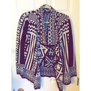 Black and cream patterned sweater