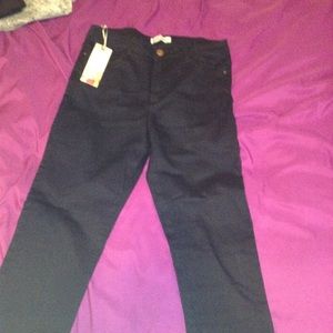 Very dark blue jeans