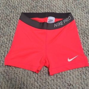 Neon pink nike pros