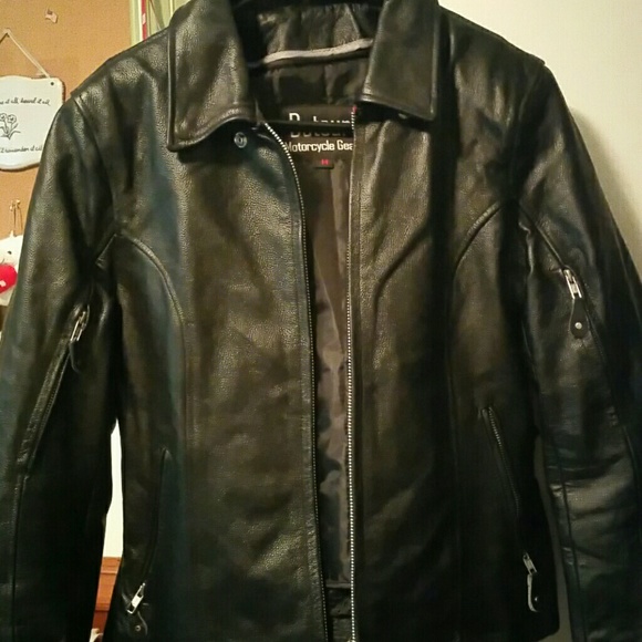 100% leather biker jacket. Heavy, lined, black &