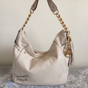 cream color purse