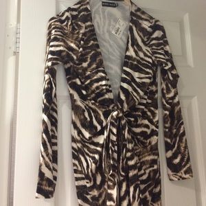 Nikki Rich Leopard print wrap dress.