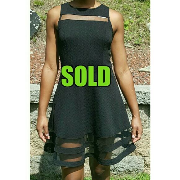 Black Dress with mesh accents: Size Medium