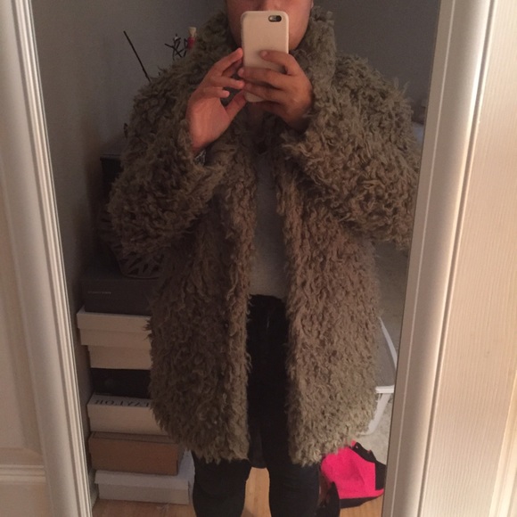 Olive sheep like material coat