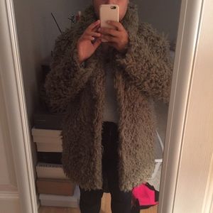 Olive sheep like material coat